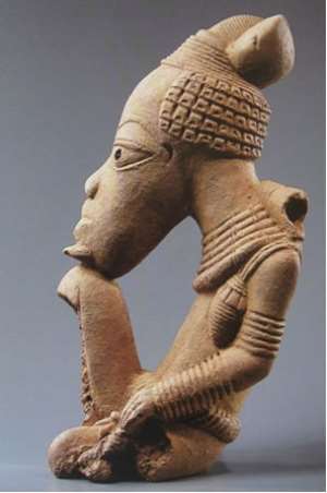 Seated person. Nok cultural object, 500 BC - 500 AD. Quai Branly, depot of Louvre, inv.No.70.1998.11. One of the three stolen items from Nigeria now in Paris.